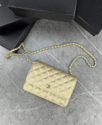 Gold cross body bag