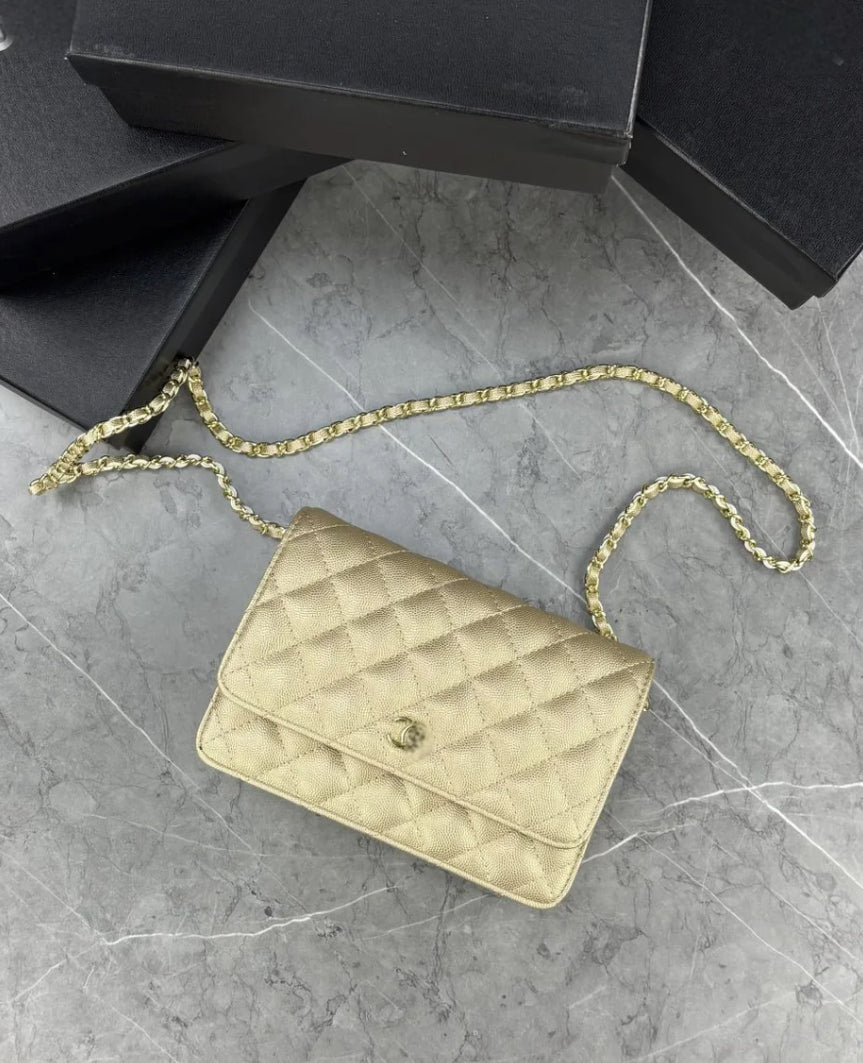 Gold cross body bag