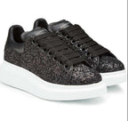 Black glitter trainers