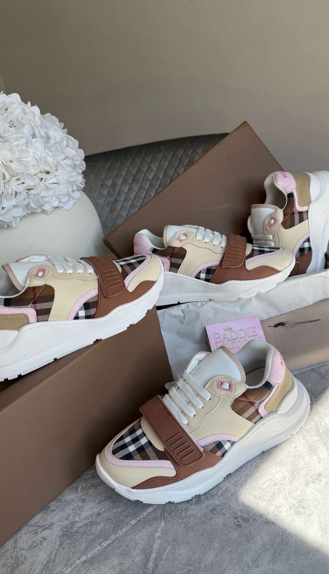 Pink grid trainers